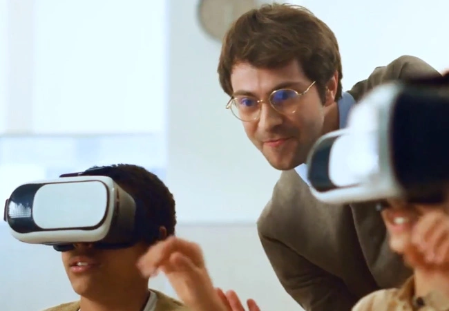 Boy wearing a virtual reality headset and looking at Human Anatomy